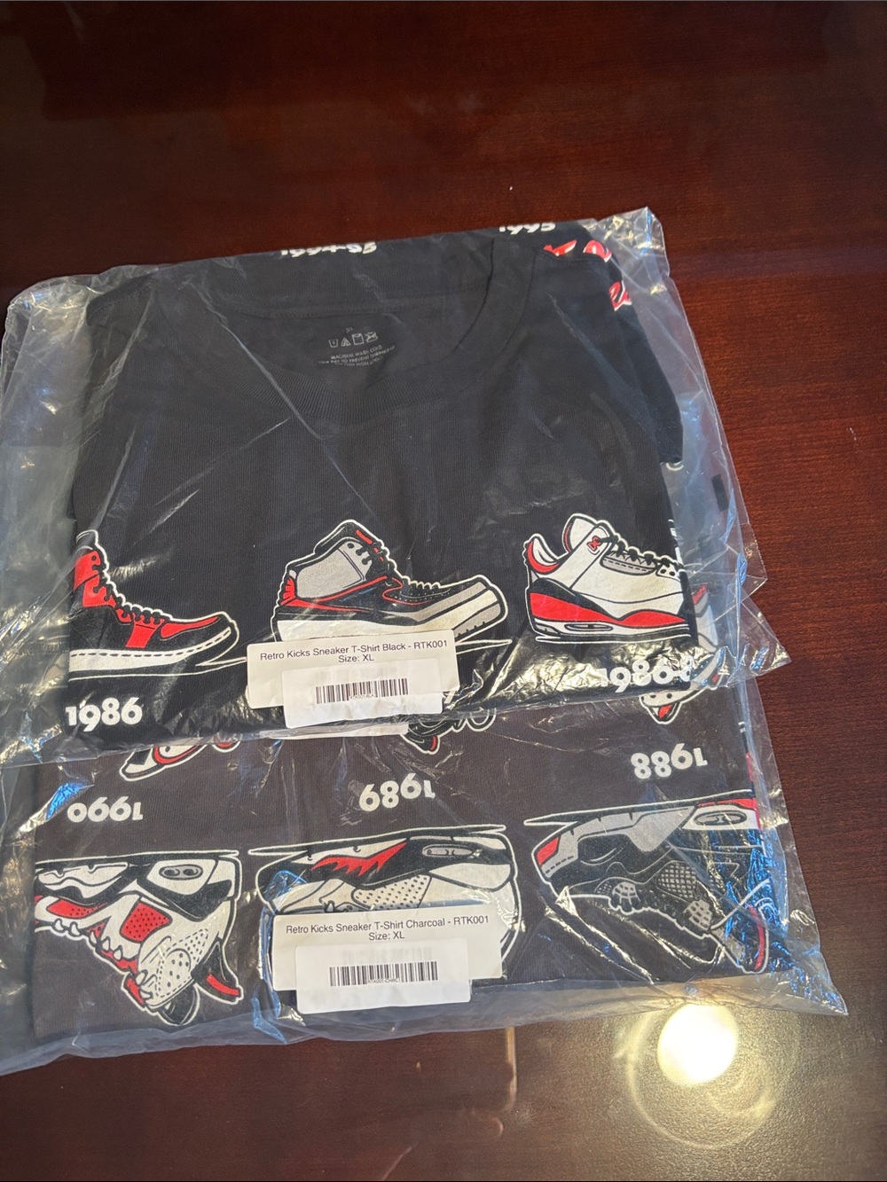 Brand new! 2 shirts - Men’s XL retro sneaker shirt